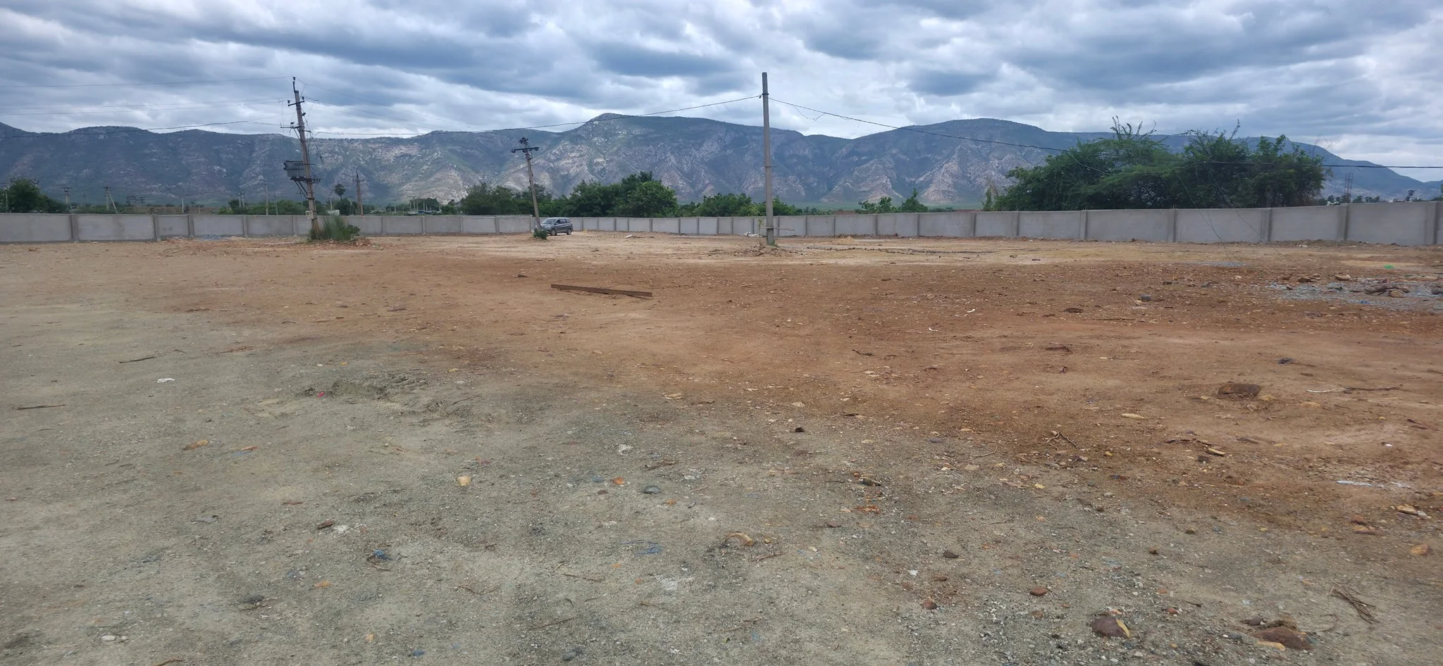 Panoramic View of Tirumala Hills and Leveled Layout Ground