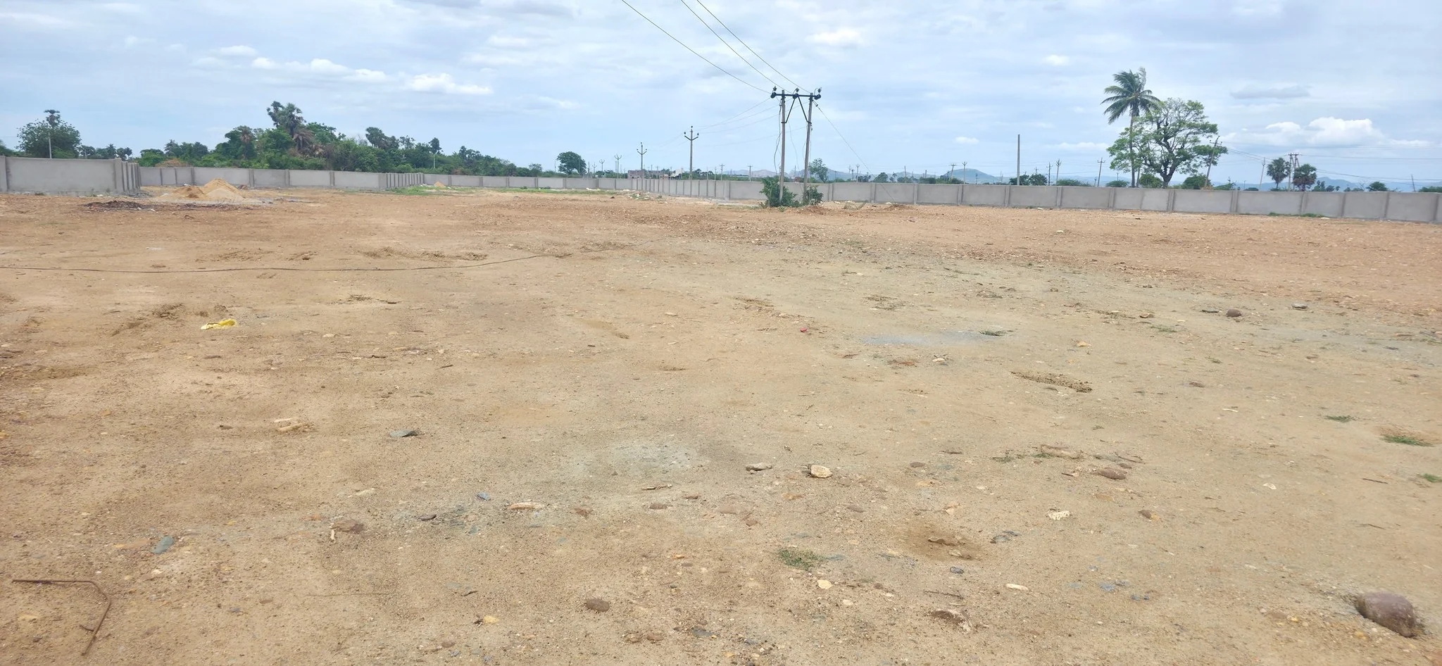 Boundary Compound Wall and Leveling Work at Elite Gardens - 1
